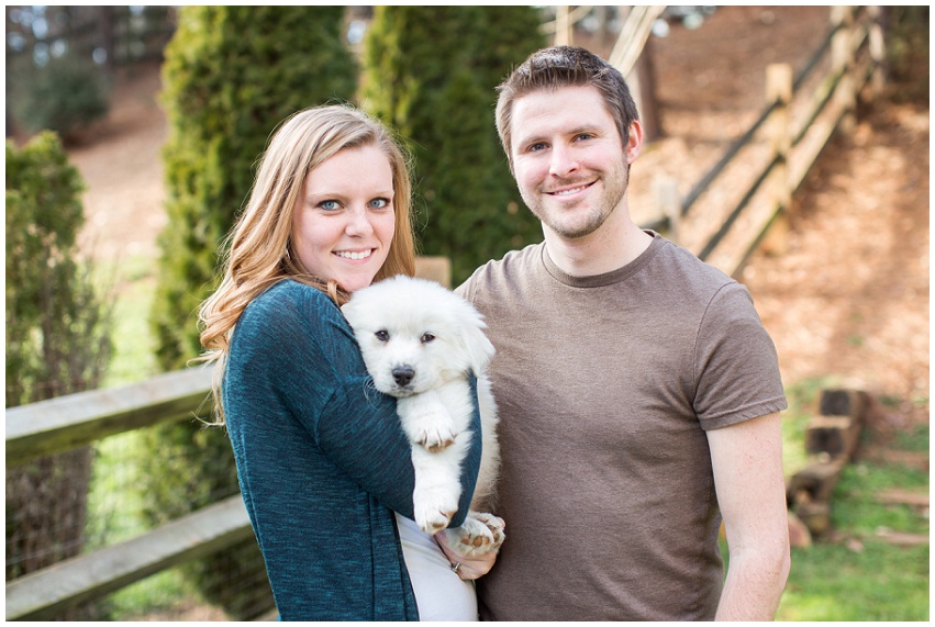 Sweet Charlotte family portrait session with great pyrenees puppy