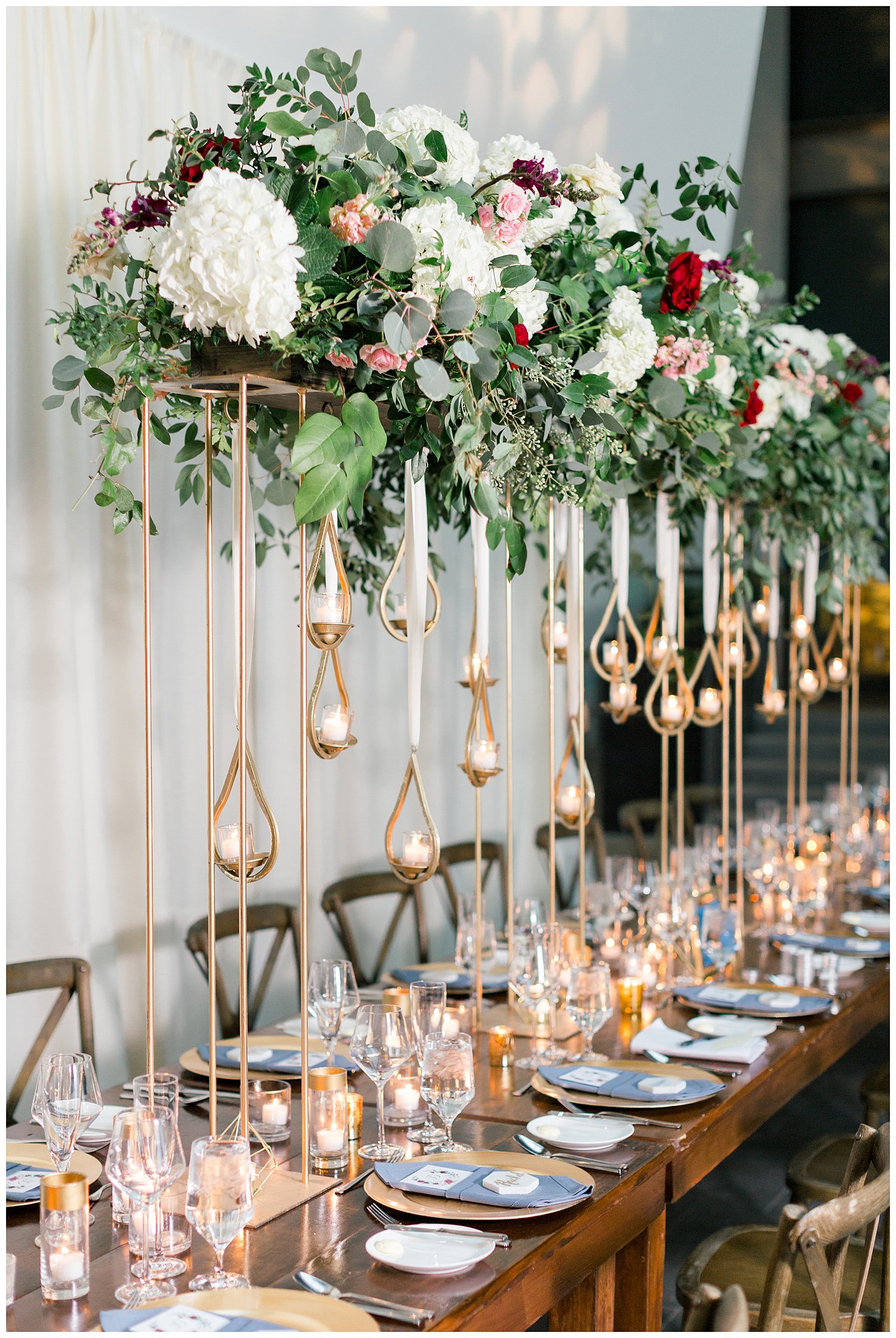 Floral and greenery head table wedding reception decor at Ritz Carlton Charlotte