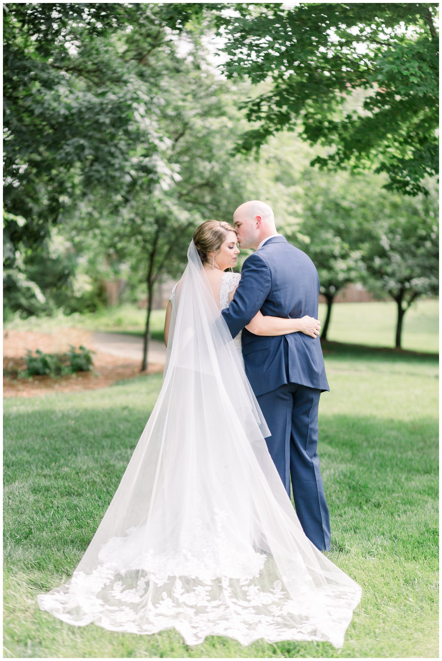Romantic photos of bride and groom St. Matthews Catholic Church Charlotte North Carolina